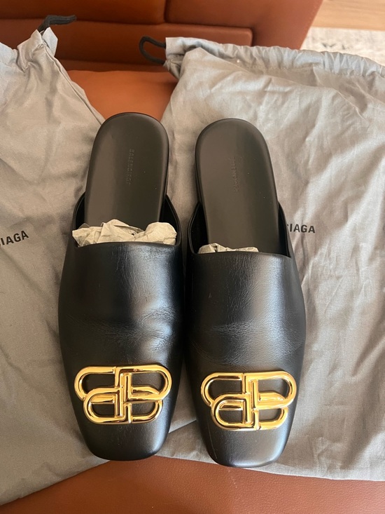 Prada Shoes - Authentic Balenciaga, black flats with gold emblem.